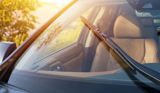 Crystal clear windshield with morning sunlight